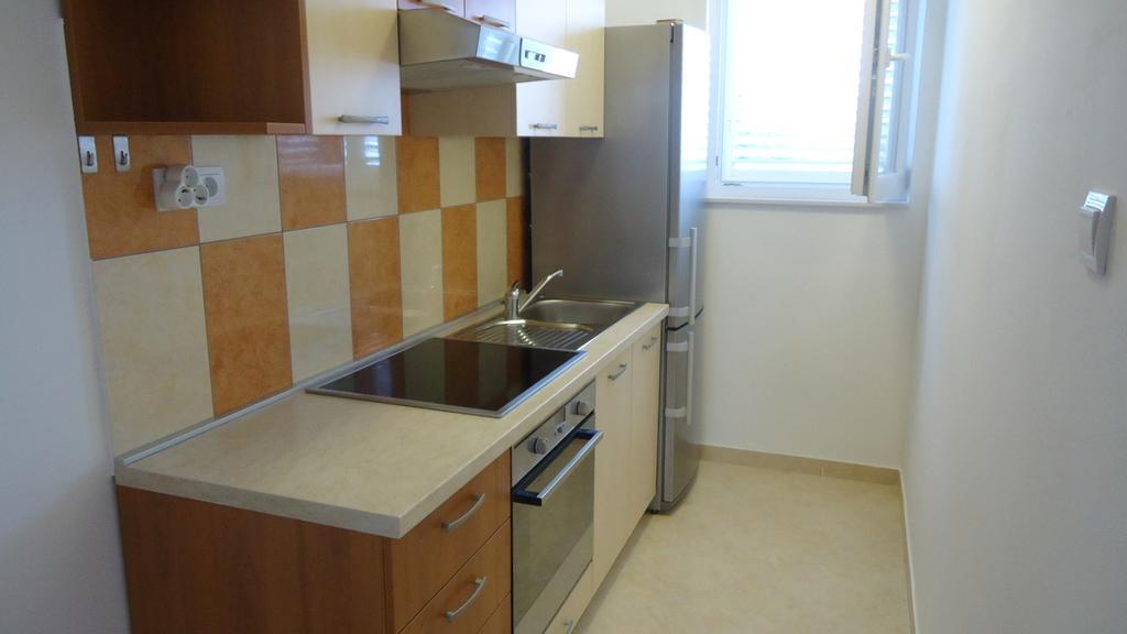 Tomi Apartament *